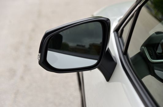 Car detail, Side mirror with turn signal of a luxury car