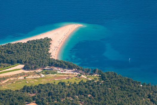 Beautiful panorama of famous Adriatic beach Zlatni Rat (Golden Cape or Golden Horn) with turquoise water , Island of Brac Croatia summertime. Famous Adriatic beach Zlatni Rat in Bol, Brac, Croatia.
