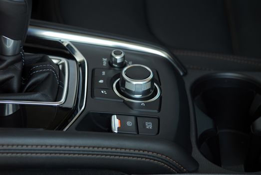 panel with buttons on the control panel of car