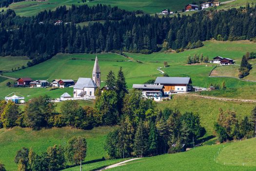 Santa Maddalena (Santa Magdalena) village with magical Dolomites mountains in background, Val di Funes valley, Trentino Alto Adige region, South Tyrol, Italy, Europe. Santa Maddalena Village, Italy. 