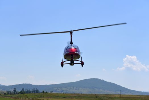 the ultralight spacecraft flies low above the ground