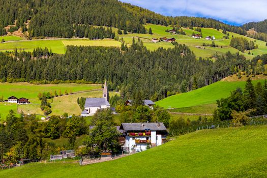 Santa Maddalena (Santa Magdalena) village with magical Dolomites mountains in background, Val di Funes valley, Trentino Alto Adige region, South Tyrol, Italy, Europe. Santa Maddalena Village, Italy. 