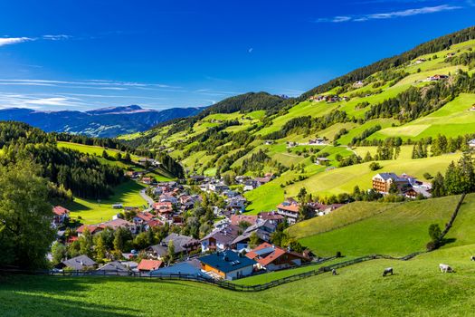 Santa Maddalena (Santa Magdalena) village with magical Dolomites mountains in background, Val di Funes valley, Trentino Alto Adige region, South Tyrol, Italy, Europe. Santa Maddalena Village, Italy. 