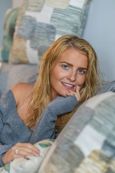 A gorgeous blonde model enjoys a day at home before work