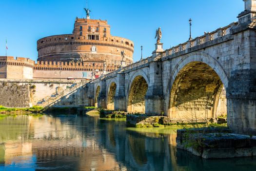 Rome, Italy. Ponte Sant Angelo, Castel Sant Angelo and Tiber River. Built by Hadrian emperor as mausoleum in 123AD ancient Roman Empire landmark.