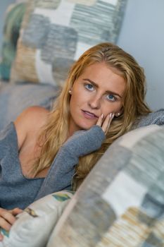 A gorgeous blonde model enjoys a day at home before work