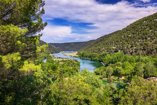 Waterfalls Krka, National Park, Dalmatia, Croatia. View of Krka National Park, Roski Slap location, Croatia, Europe. Beautiful world of Mediterranean countries. Traveling concept background.