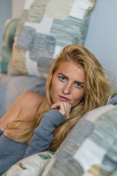 A gorgeous blonde model enjoys a day at home before work