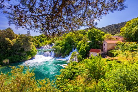 Waterfalls Krka, National Park, Dalmatia, Croatia. View of Krka National Park, Roski Slap location, Croatia, Europe. Beautiful world of Mediterranean countries. Traveling concept background.