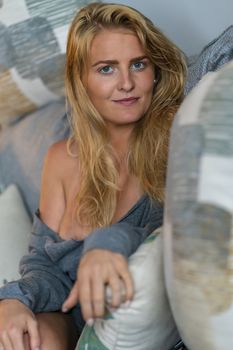 A gorgeous blonde model enjoys a day at home before work