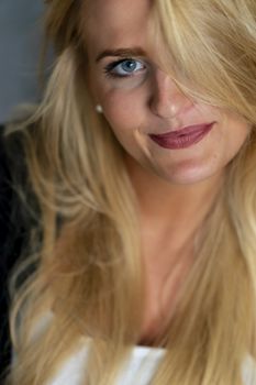 A gorgeous blonde model enjoys a day at home before work