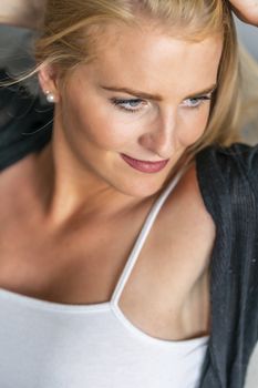 A gorgeous blonde model enjoys a day at home before work