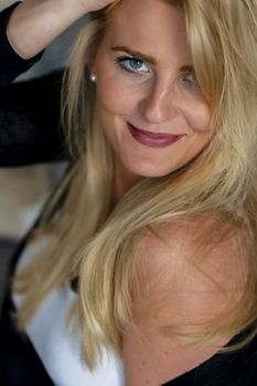 A gorgeous blonde model enjoys a day at home before work