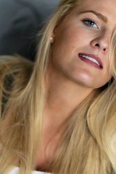 A gorgeous blonde model enjoys a day at home before work