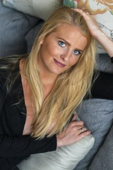 A gorgeous blonde model enjoys a day at home before work