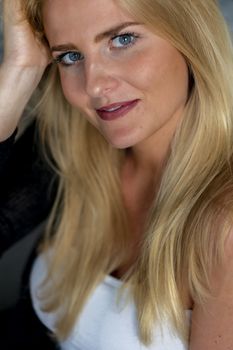 A gorgeous blonde model enjoys a day at home before work