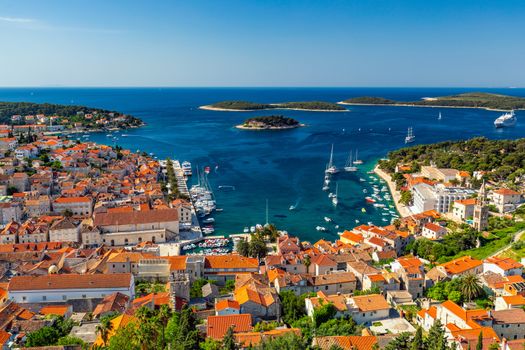 View at amazing archipelago in front of town Hvar, Croatia. Harbor of old Adriatic island town Hvar. Popular touristic destination of Croatia. Amazing Hvar city on Hvar island, Croatia.