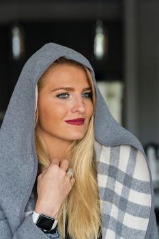 A gorgeous blonde model enjoys a day at home before work