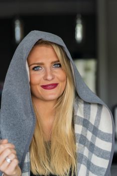 A gorgeous blonde model enjoys a day at home before work