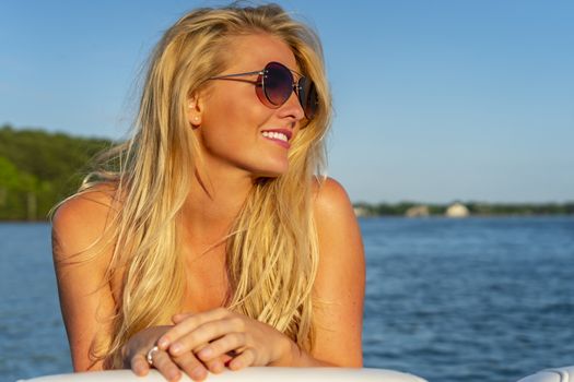 A gorgeous bikini model enjoying a day on the water