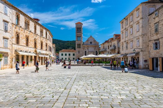Main square in old medieval town Hvar. Hvar is one of most popular tourist destinations in Croatia in summer. Central Pjaca square of Hvar town, Dalmatia, Croatia. 