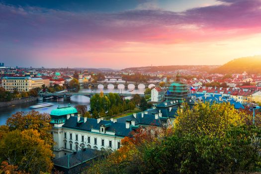 Charles Bridge in Prague in Czechia. Prague, Czech Republic. Charles Bridge (Karluv Most) and Old Town Tower. Vltava River and Charles Bridge. Concept of world travel, sightseeing and tourism.