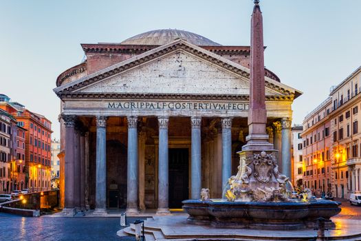 Pantheon, former Roman temple of all gods, now a church, and Fountain with obelisk at Piazza della Rotonda. Rome, Italy