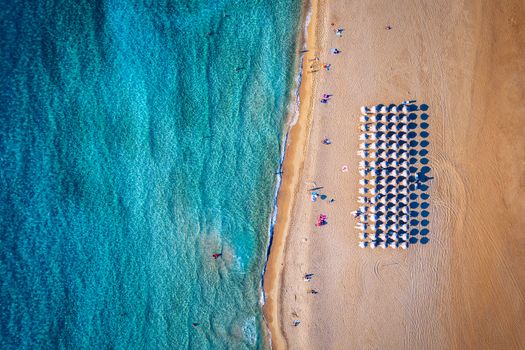 Aerial shot of beautiful turquoise beach Falasarna (Falassarna) in Crete, Greece. View of famous paradise sandy deep turquoise beach of Falasarna (Falassarna) in North West, Crete island, Greece.