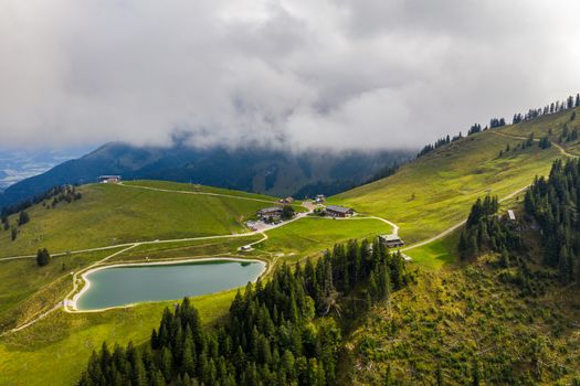 Bayrischzell municipality aerial view, with a view of Osterhofen town. German beautiful nature and green forests, Bavaria, Germany. The village Bayrischzell in mountains of Alps, Bavaria Germany.