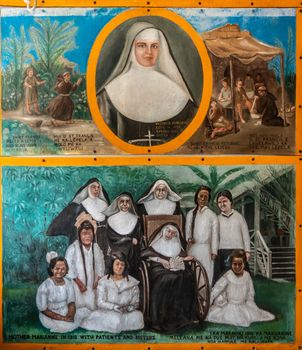 Kalapana, Hawaii, USA. - January 14, 2020: Mary, Star of the Sea Catholic Church. Painting of nun Saint Marianne Cope images with lepers and her team on Molokai Island.