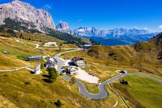 Gardena Pass, Trentino Alto Adige, Italy. Gardena Pass with Sassolungo mountain on the background. Passo Gardena, alpine pass between Val Badia and Val Gardena, South Tyrol, Italy.