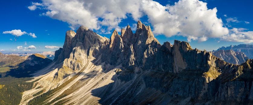 Seceda in autumn in South Tyrol in the Alps of North Italy. Views from Seceda over the Odle mountains in autumn with fall colors. Seceda, Val Gardena, Trentino Alto Adige, South Tyrol in Italy.
