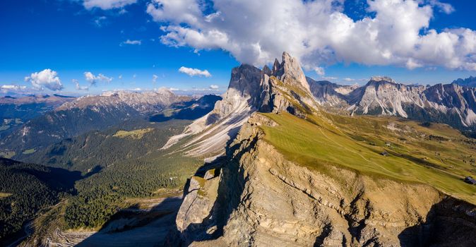 Panorama on Seceda peaks. Trentino Alto Adige, Dolomites Alps, South Tyrol, Italy. Odle mountain range, Val Gardena. Majestic Furchetta peak. Odles group seen from Seceda, Santa Cristina Val Gardena.