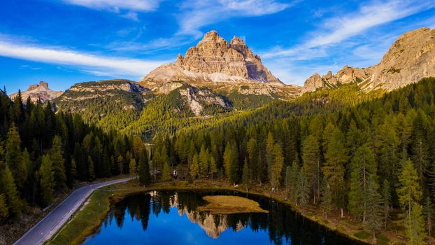 Aerial drone view of Lake Antorno (Lago di Antorno) located in Dolomites area, Belluno Province, Italy. Lake Antorno, Three Peaks of Lavaredo, Lake Antorno and Tre Cime di Lavaredo, Dolomites, Italy.