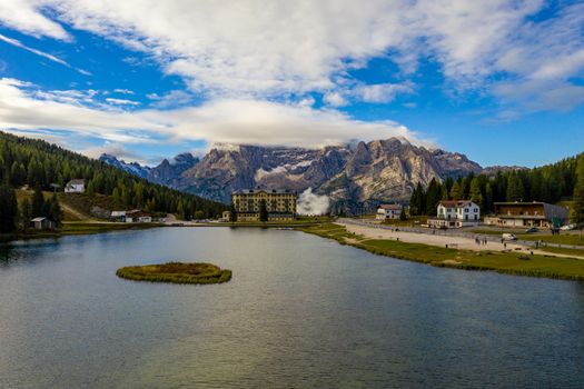 Lake Misurina or Lago di Misurina Italy. Misurina Lake with perfect sky reflection in calm water. Stunning view on the majestic Dolomites Alp Mountains, Italy, National Park Tre Cime di Lavaredo.