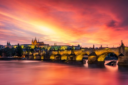 Charles Bridge at sunset with colorful sky, Prague, Czech Republic. Prague old town and iconic Charles bridge and Castle, Czech Republic. Charles Bridge (Karluv Most), Old Town Tower and Castle.