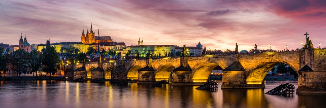 Charles Bridge at sunset with colorful sky, Prague, Czech Republic. Prague old town and iconic Charles bridge and Castle, Czech Republic. Charles Bridge (Karluv Most), Old Town Tower and Castle.