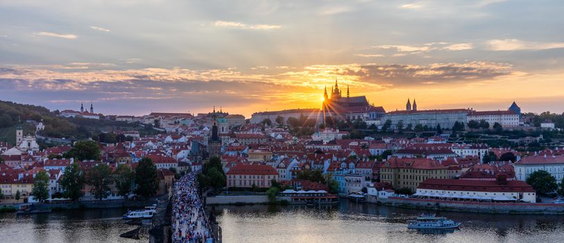 Charles Bridge in Prague in Czechia. Prague, Czech Republic. Charles Bridge (Karluv Most) and Old Town Tower. Vltava River and Charles Bridge. Concept of world travel, sightseeing and tourism.