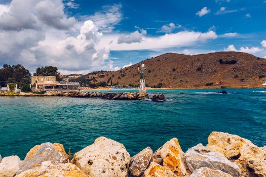View of sunbeds awaiting tourists at the Greek island resort of Georgioupolis on Crete north coast. Georgioupoli is a resort village and former municipality in the Chania regional unit, Crete, Greece.