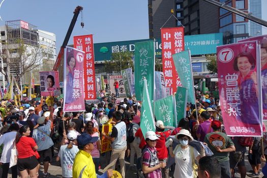 KAOHSIUNG, TAIWAN -- NOVEMBER 11, 2018: A speaker addresses protesters who have gathered to take part in a demonstration against the problem of serious air pollution.
