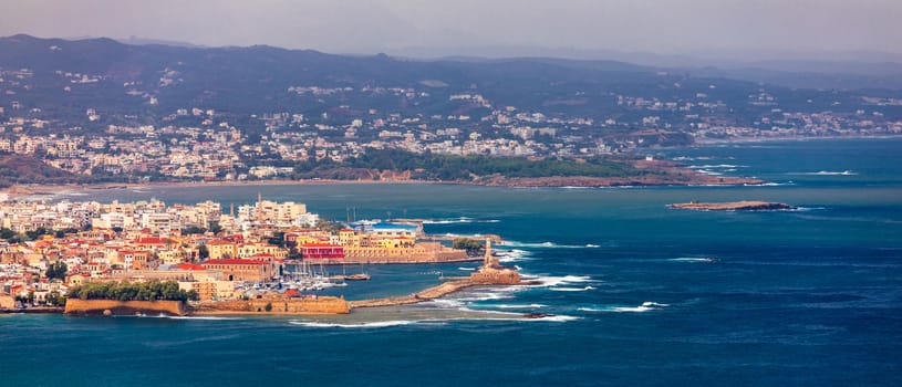 Picturesque old port of Chania. Landmarks of Crete island. Greece. Bay of Chania at sunny summer day, Crete Greece. View of the old port of Chania, Crete, Greece. The port of chania, or Hania. 