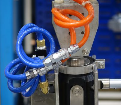 KAOHSIUNG, TAIWAN -- MARCH 30, 2019: High tech equipment with pressure hoses and valves at the Kaohsiung Industrial Automation Exhibition.
