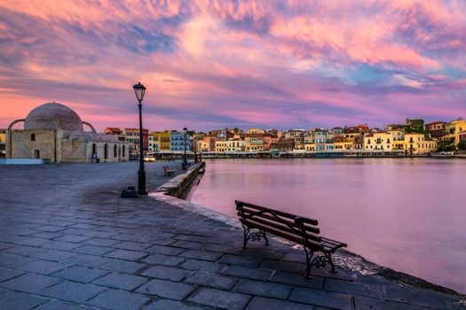 Venetian Harbour of the city of Chania at sunrise with turquoise water, Crete, Greece. View of the old port of Chania on Crete, Greece. Chania, Crete, Greece. View of the old port of Chania on Crete.