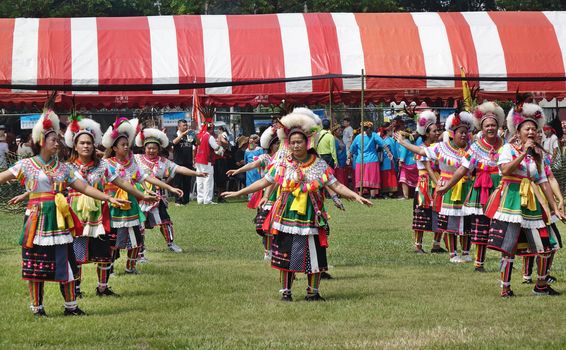 KAOHSIUNG, TAIWAN -- SEPTEMBER 28, 2019: Women of the indigenous Amis tribe perform a dance during the traditional harvest festival.