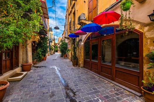 Street in the old town of Chania, Crete, Greece. Charming streets of Greek islands, Crete. Beautiful street in Chania, Crete island, Greece. Summer landscape. Chania old street of Crete island Greece.