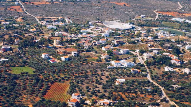 Crete island. Beautiful view of the Crete island Greece from the plane. Holiday, relaxation, sea. Crete view from plane. Greek Island. Seaside of Crete island, aerial view, Greece.