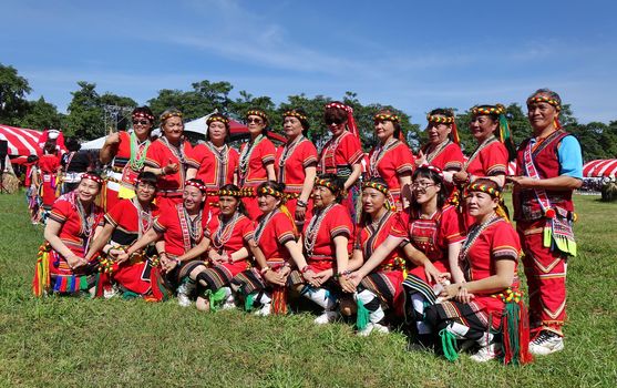 KAOHSIUNG, TAIWAN -- SEPTEMBER 29, 2018: Member of the indigenous Amis tribe in traditional costumes participate in the yearly harvest festival.

