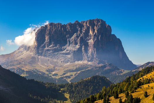 Gardena Pass, Trentino Alto Adige, Italy. Gardena Pass with Sassolungo mountain on the background. Passo Gardena, alpine pass between Val Badia and Val Gardena, South Tyrol, Italy.