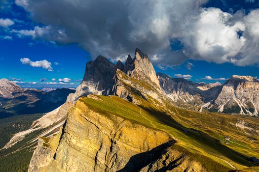 View on Seceda peak. Trentino Alto Adige, Dolomites Alps, South Tyrol, Italy. Odle mountain range, Val Gardena. Majestic Furchetta peak. Odles group seen from Seceda, Santa Cristina Val Gardena.