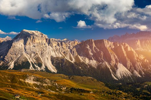 Seceda in autumn in South Tyrol in the Alps of North Italy. Views from Seceda over the Odle mountains in autumn with fall colors. Seceda, Val Gardena, Trentino Alto Adige, South Tyrol in Italy.